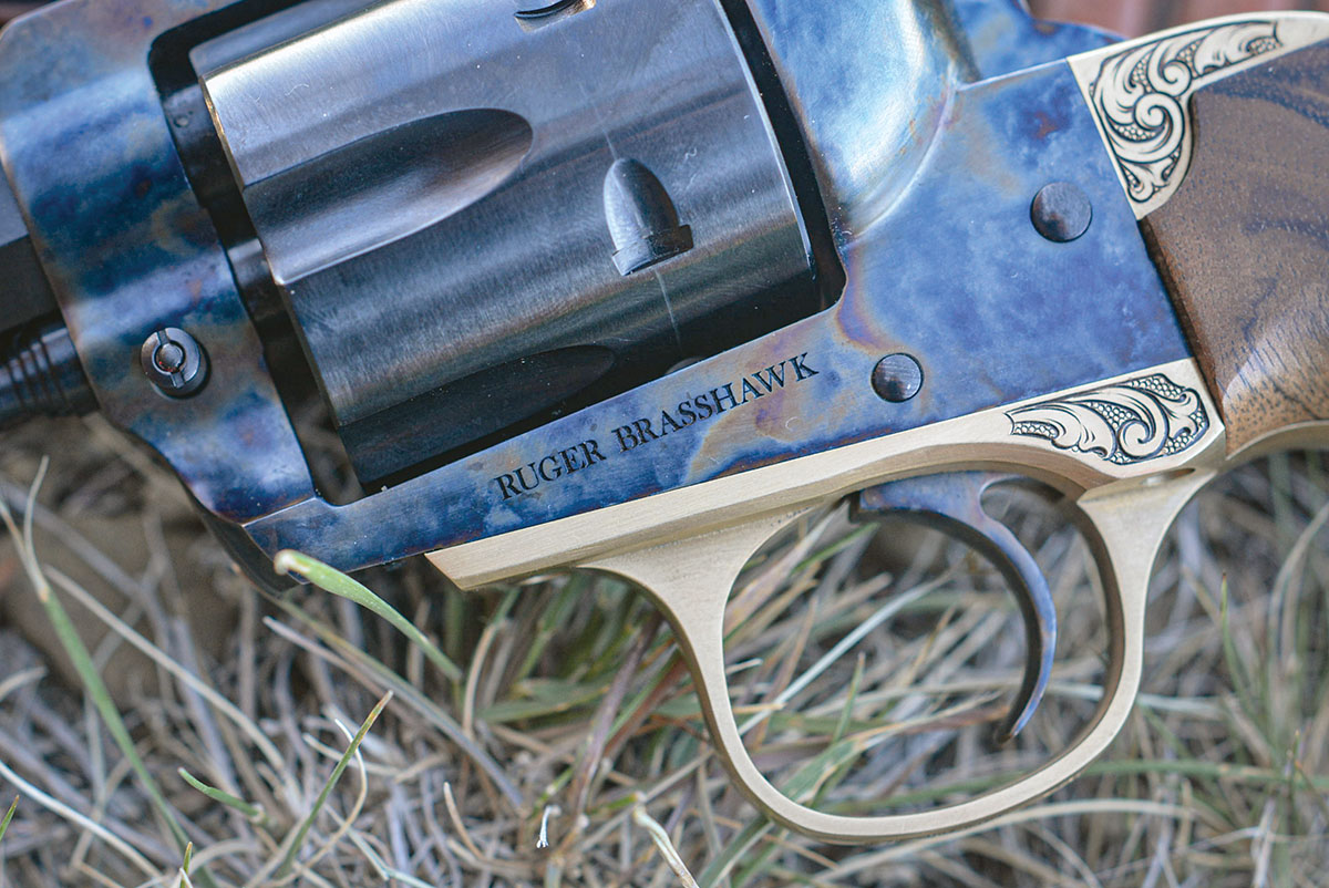 Appropriately named the Brasshawk, this custom-built sixgun from Bobby Tyler and Ronnie Wells features a hand-engraved brass grip frame.